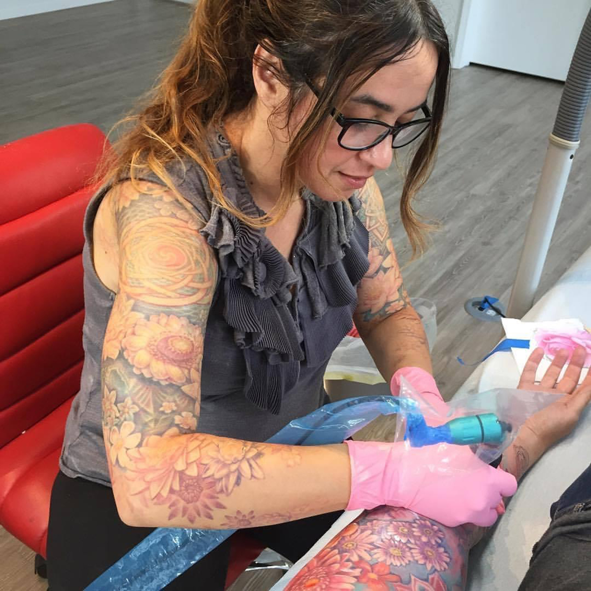 Michele Aitchison tattooing