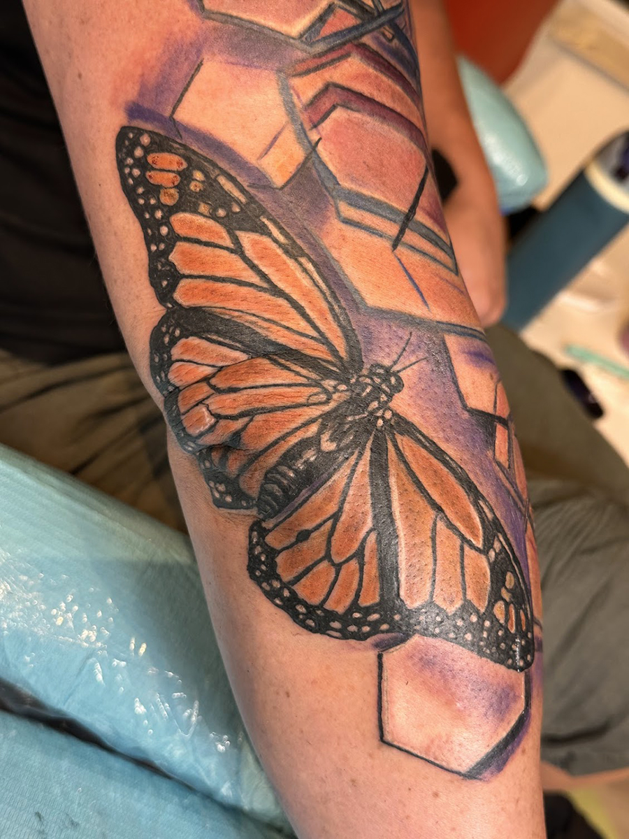 Mid-size tattoo by Michele Aitchison